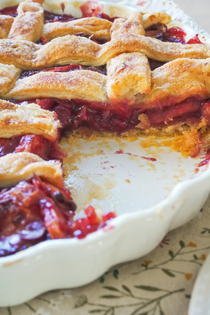 B roll 1: A closeup of the Apple Cherry Almond Pie with a slice missing